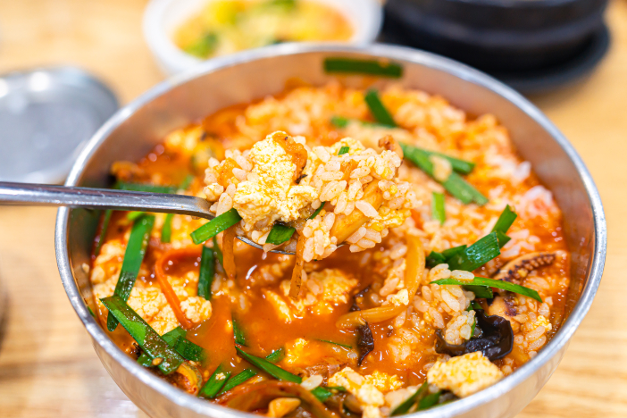Try the spicy seafood and soft tofu stew at Chodang Soondubu (Soft Tofu) Village