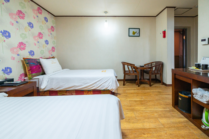 A Triple Rooms consist of a double bed and a single bed.