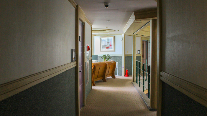 The corridors of DaWoo Resort have spaces for all guests to sit and talk while looking out over the ocean.