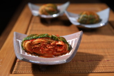 Kimchi-Pickles made of Radish or Cabbage or Cucumber spiced with Pepper & Garlic & Ginger etc Kimchi-Pickles made of Radish or Cabbage or Cucumber spiced with Pepper & Garlic & Ginger etc