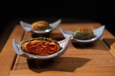 Kimchi-Pickles made of Radish or Cabbage or Cucumber spiced with Pepper & Garlic & Ginger etc Kimchi-Pickles made of Radish or Cabbage or Cucumber spiced with Pepper & Garlic & Ginger etc