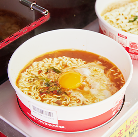 A classic convenience store ramyeon at Hangang Park after a bike ride
