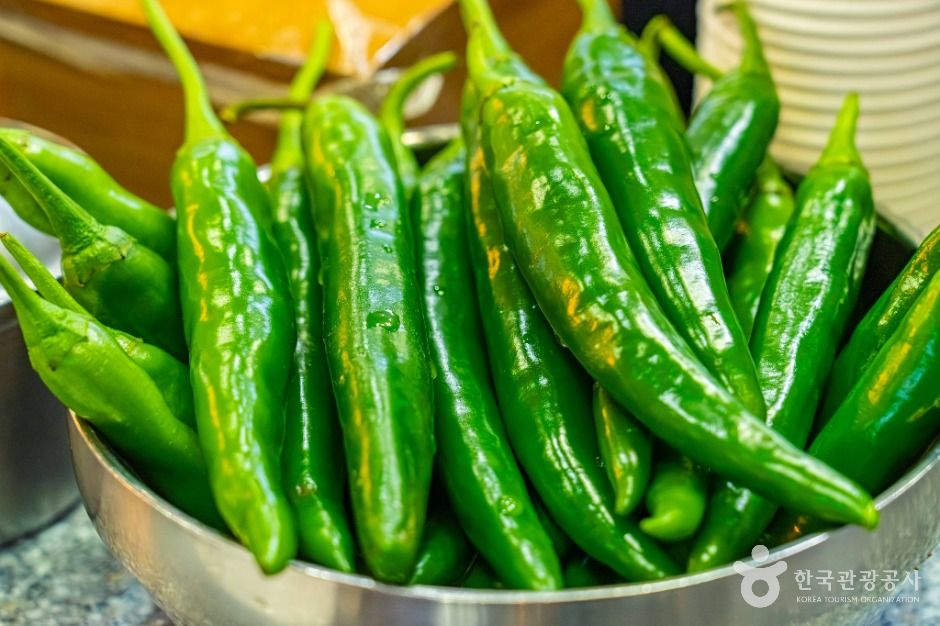 Fresh green chili peppers served as a side dish