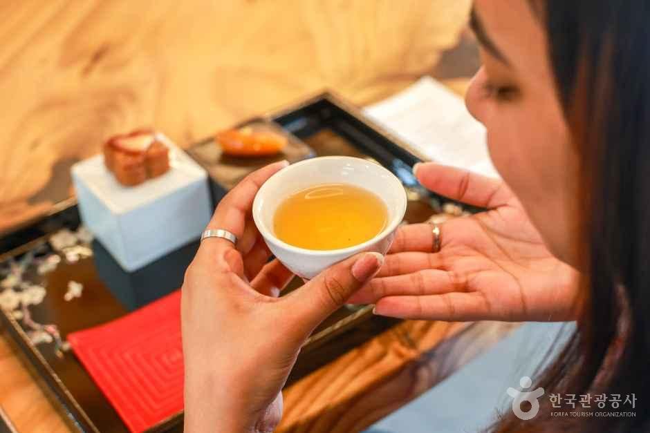 Enjoying Flower Tea and Traditional Korean Desserts After the Meal