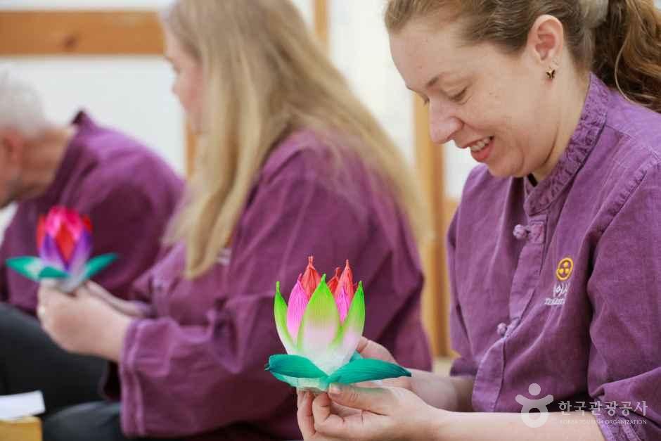 A Participant Creating a Traditional Lotus Lantern