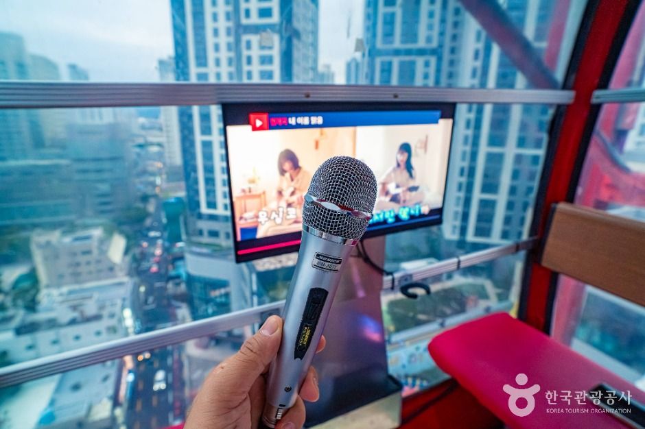 Karaoke machine inside the Ferris wheel cabin