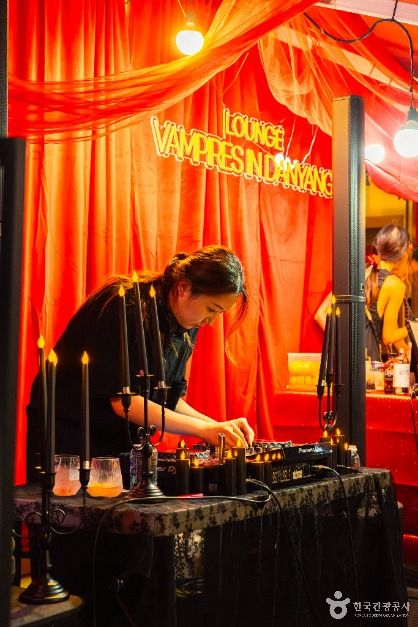 A DJ in Dracula costume 