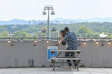 Looking toward Munsan with a digital telescope at DMZ Station