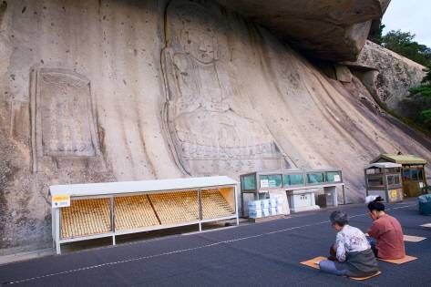 Rock-carved Seated Bodhisattva (Credit: Getty Images) 