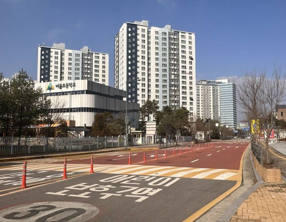 Any time you enter a red-colored pavement, you must slow down 